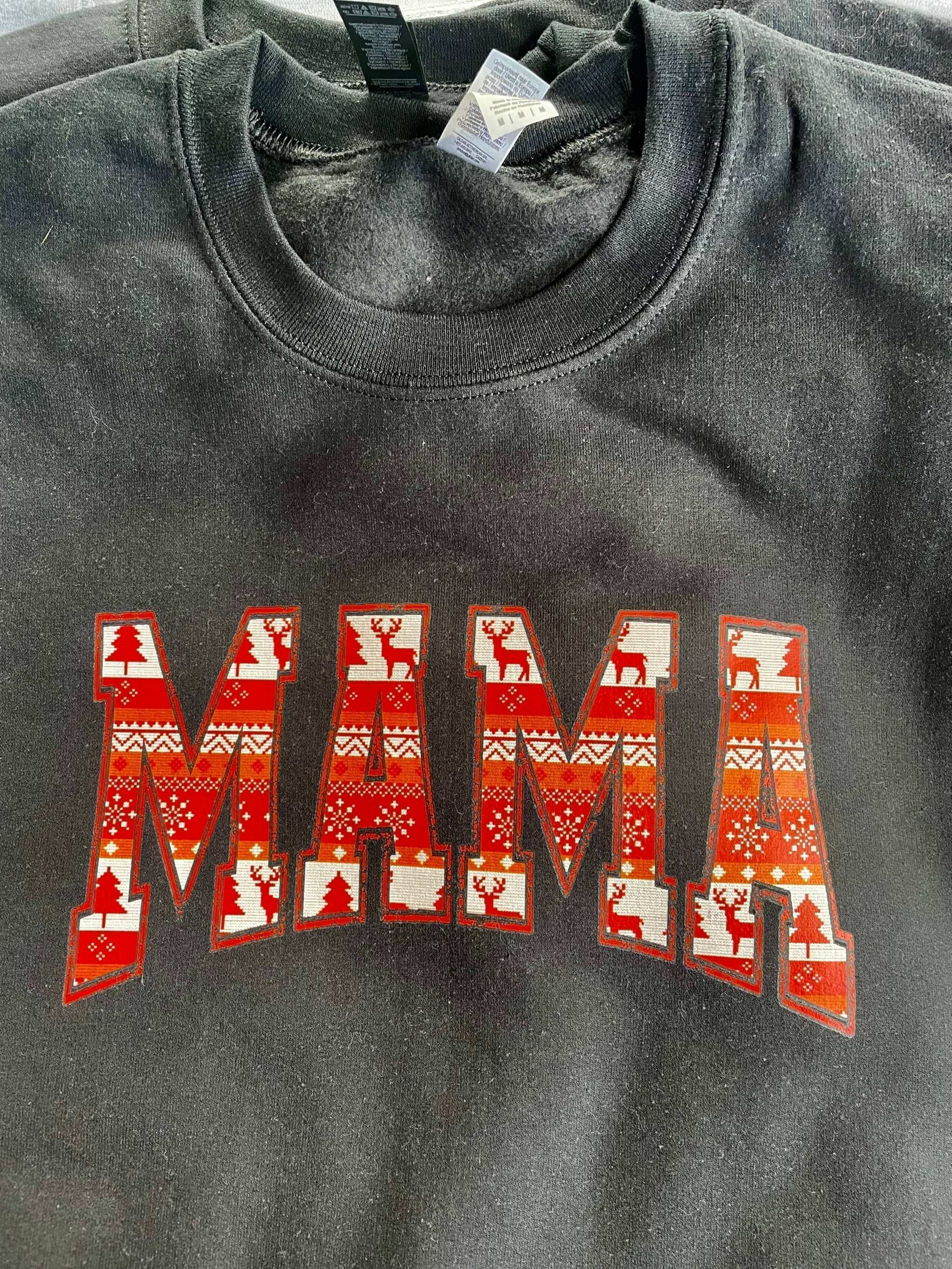 MAMA black crewneck sweatshirt with red and white Native print design.