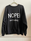 Black cotton crewneck sweatshirt with "Nope, not today" text, made from warm cotton.