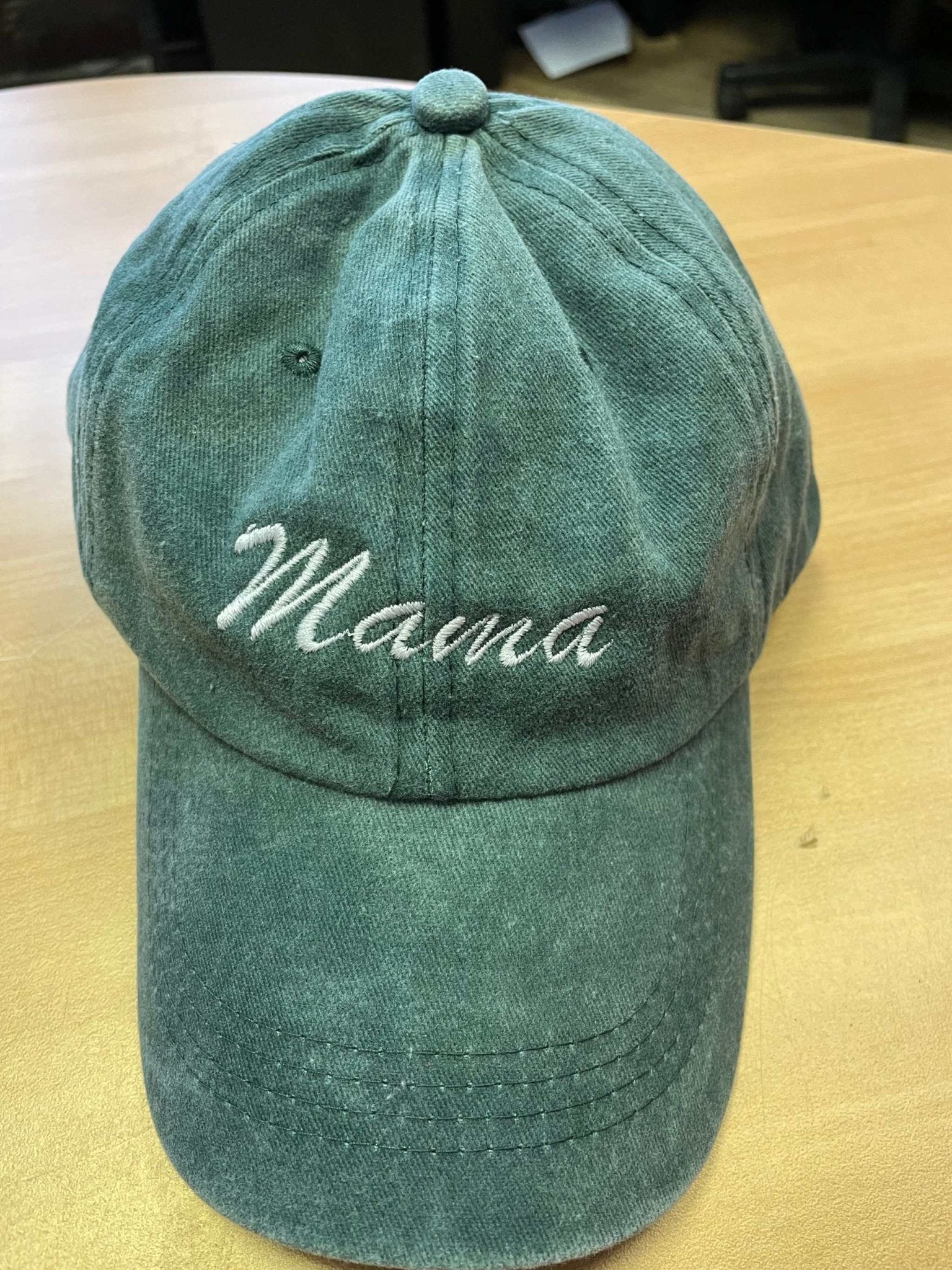 Green cotton baseball hat with Mama embroidery and adjustable strap