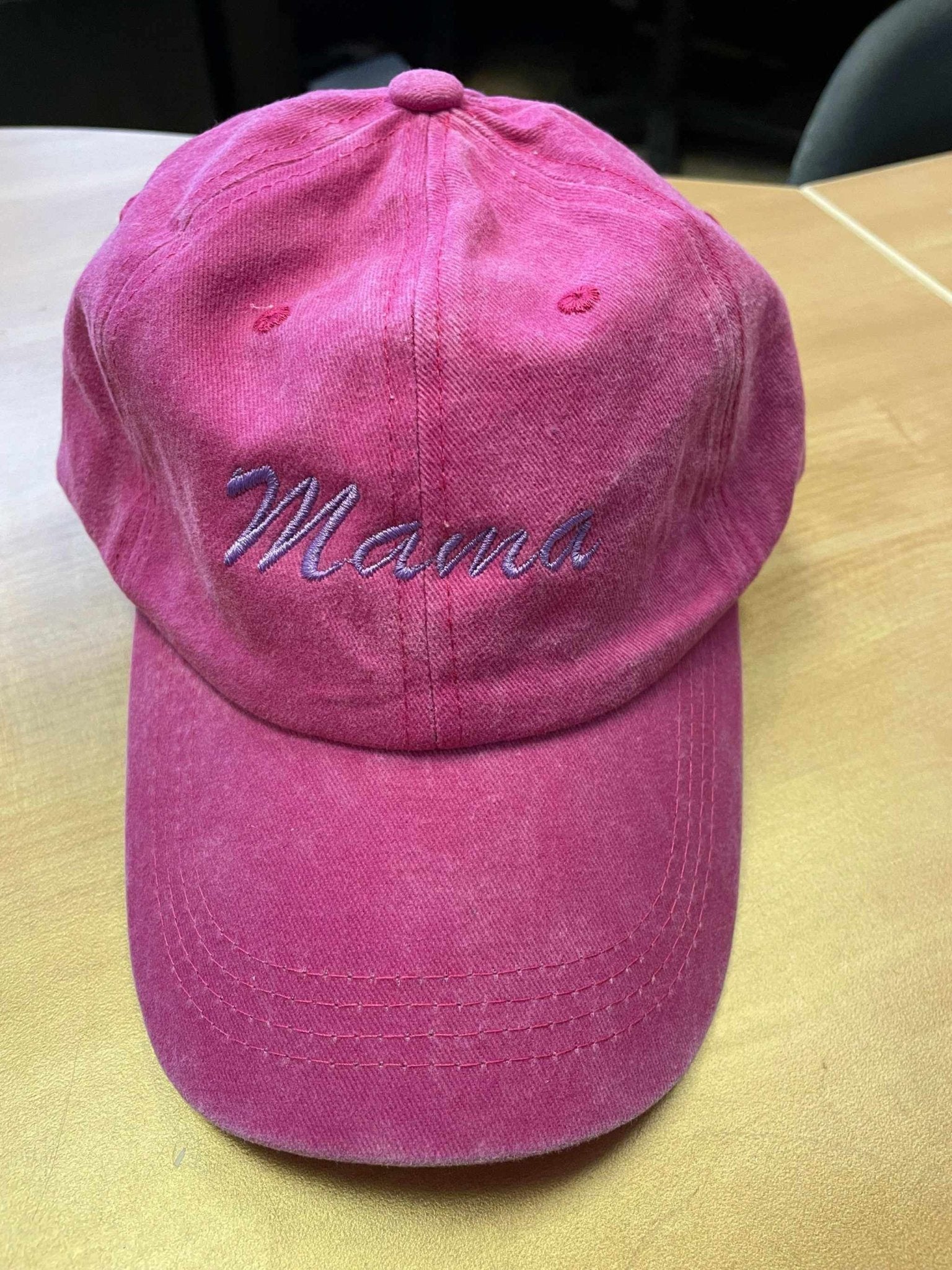 Pink cotton baseball hat with embroidered "Mama" logo and adjustable strap
