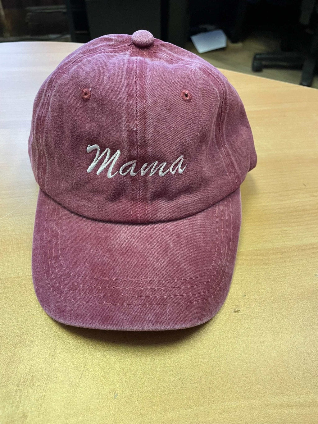 red cotton baseball hat with Mama embroidery and adjustable strap