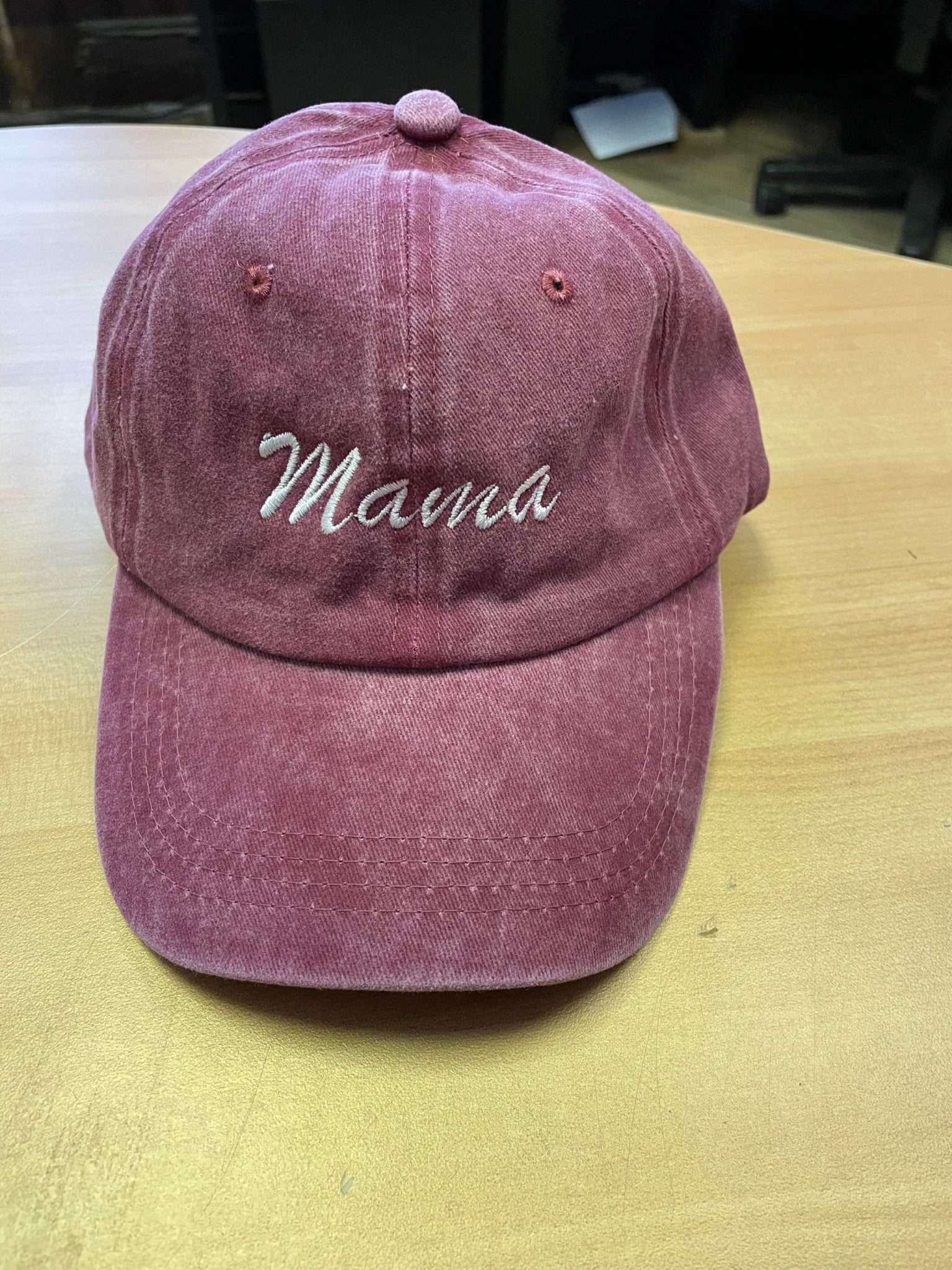 red cotton baseball hat with Mama embroidery and adjustable strap