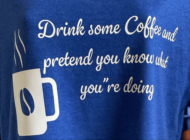 Blue cotton V-neck coffee tee shirt with coffee cup graphic and humorous text design