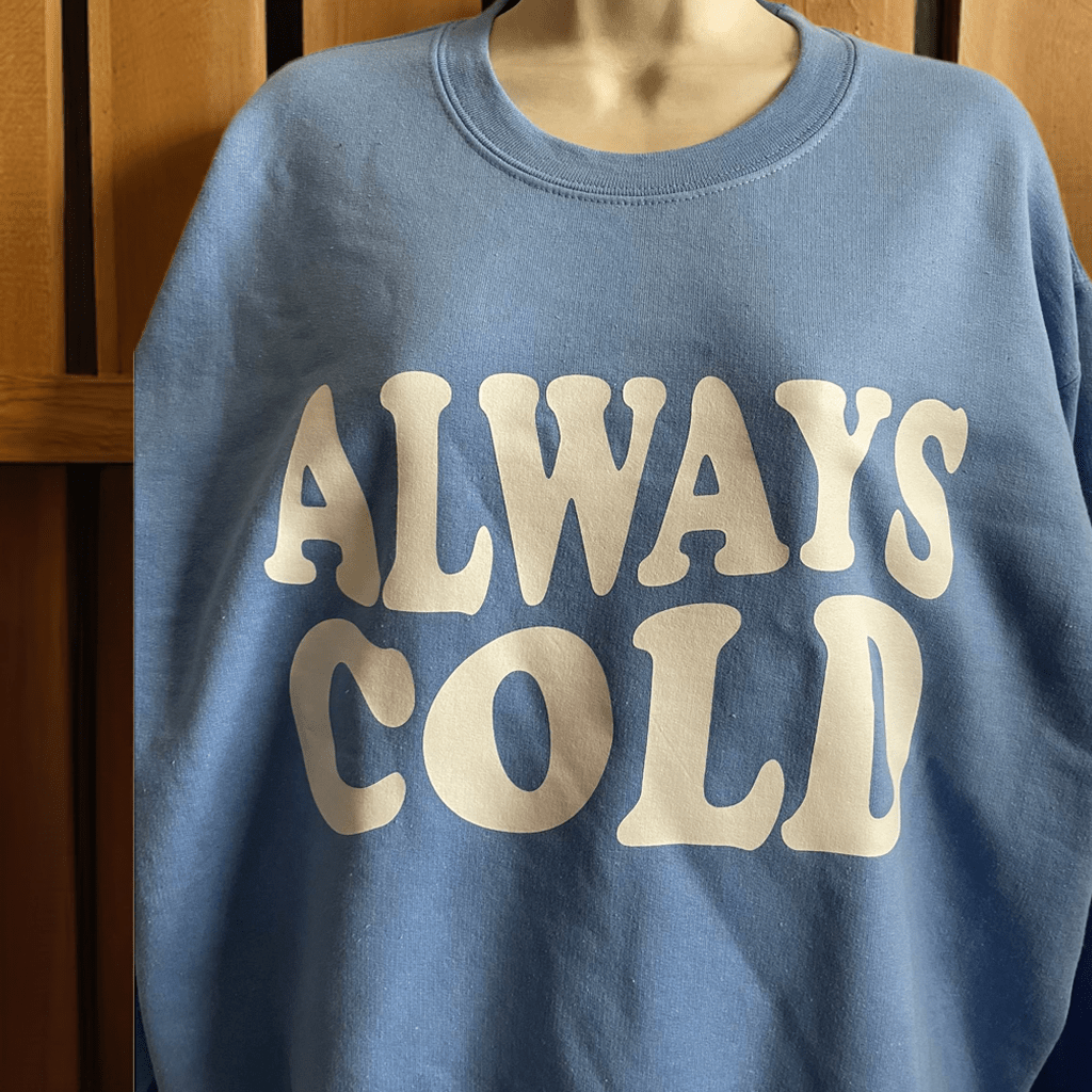 Blue cotton crewneck sweatshirt with Always Cold logo front design