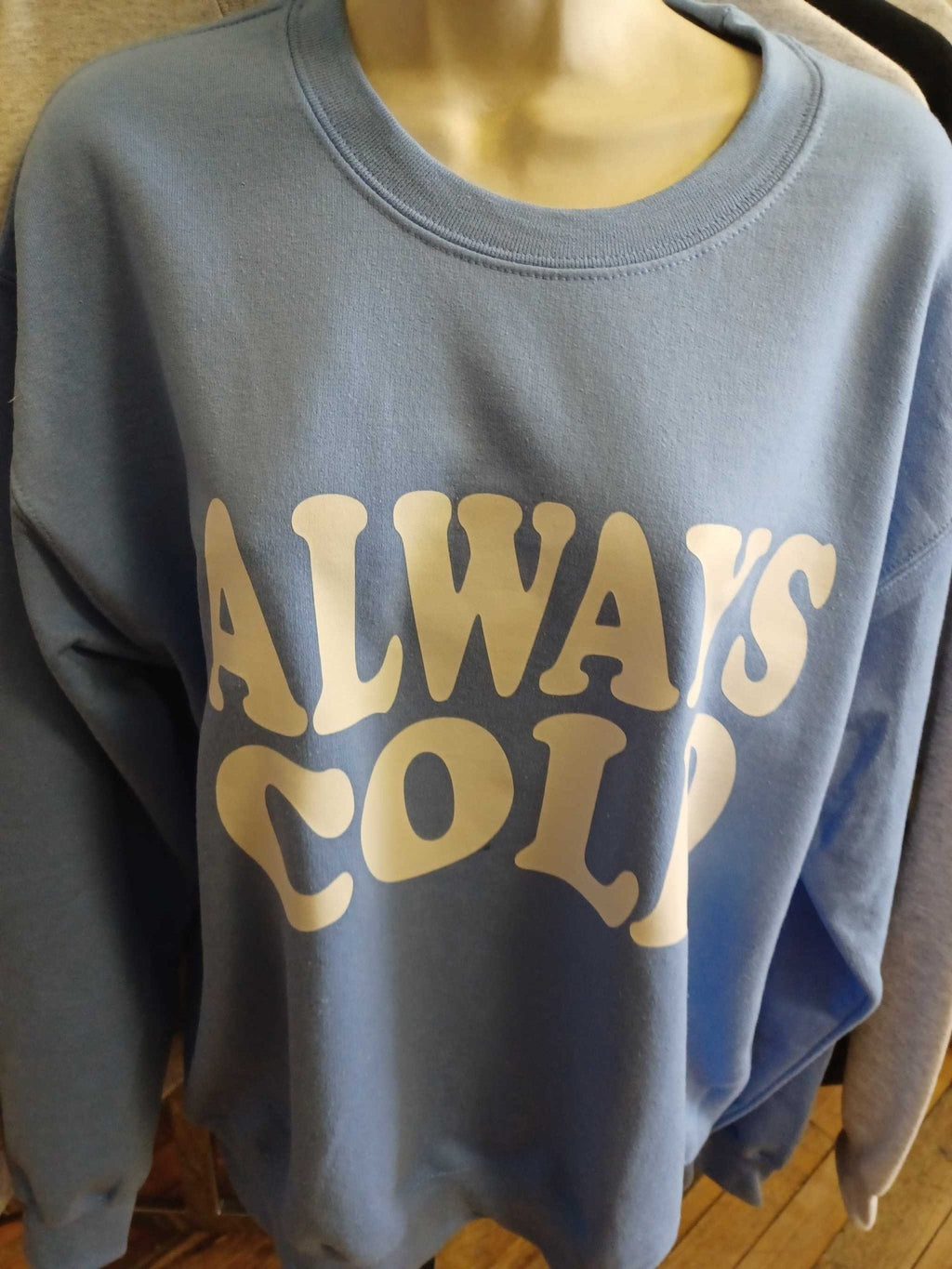 Always Cold blue cotton crewneck sweatshirt with white logo text