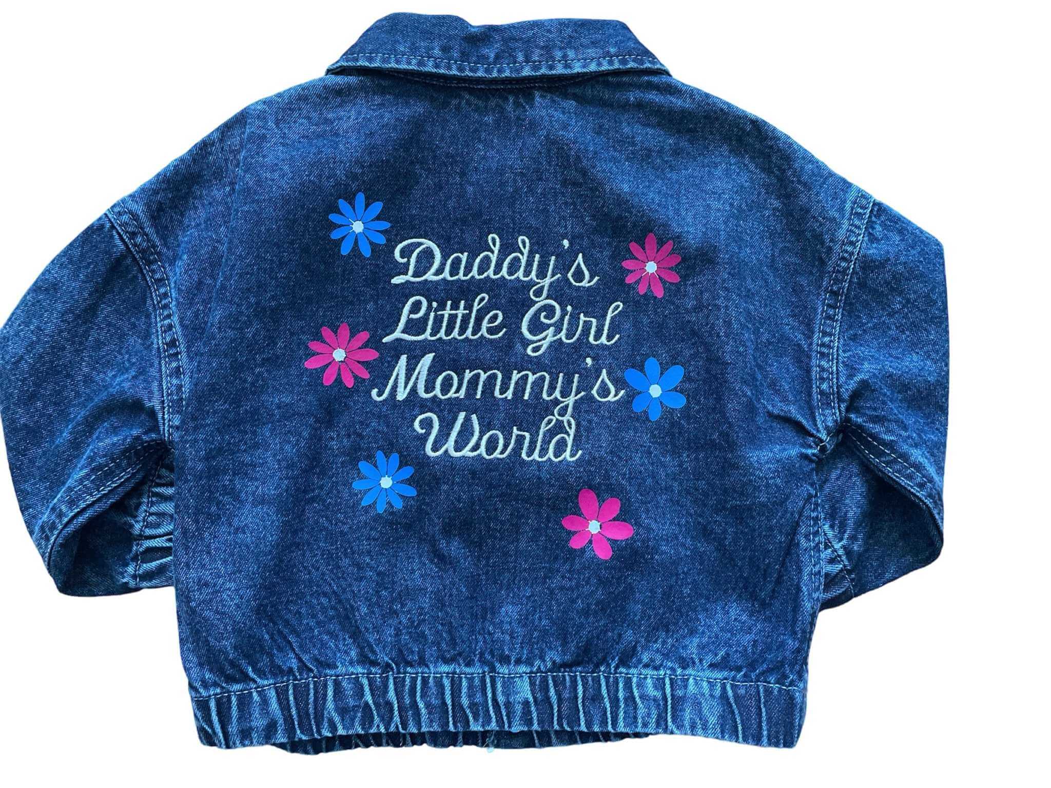 Blue denim jacket for girls embroidered with "Daddy’s Little Girl Mommy’s Whole World" and colorful flowers