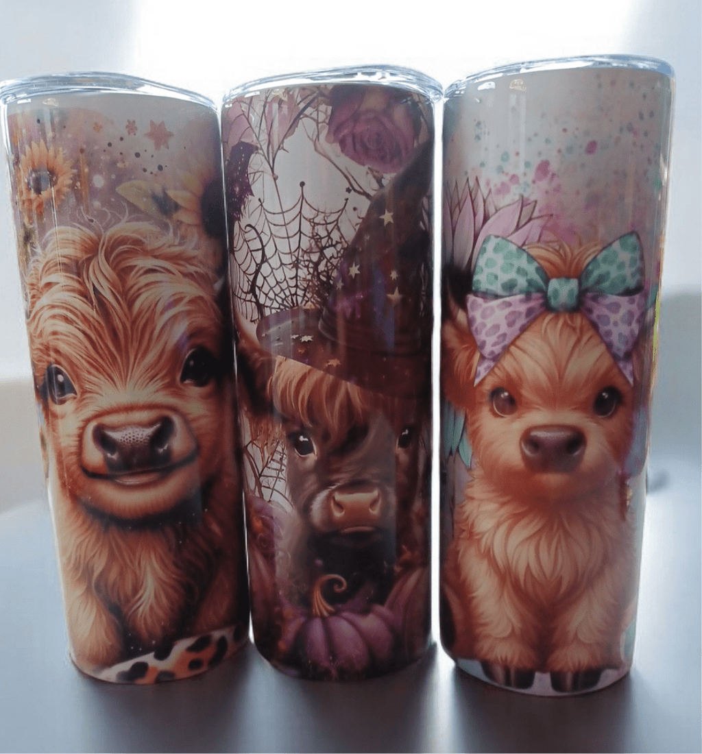Double wall tumblers with cute animal designs, stainless steel, spill-proof lids, and temperature retention.