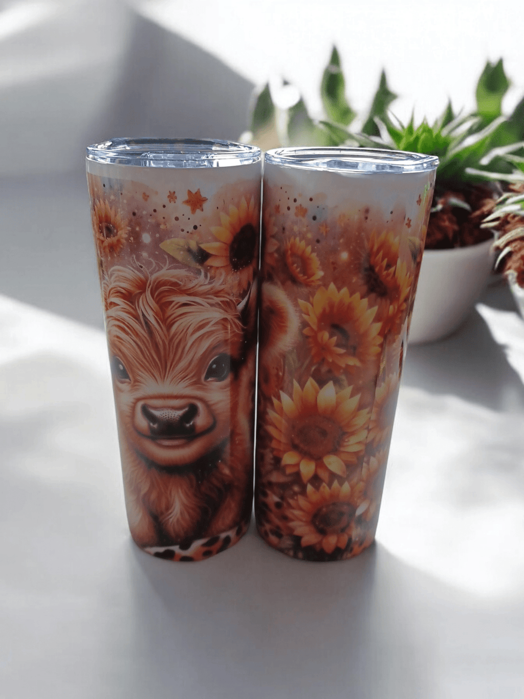 Double wall tumblers with sunflower and animal design, stainless steel, insulated for hot and cold drinks, leak-proof lid.