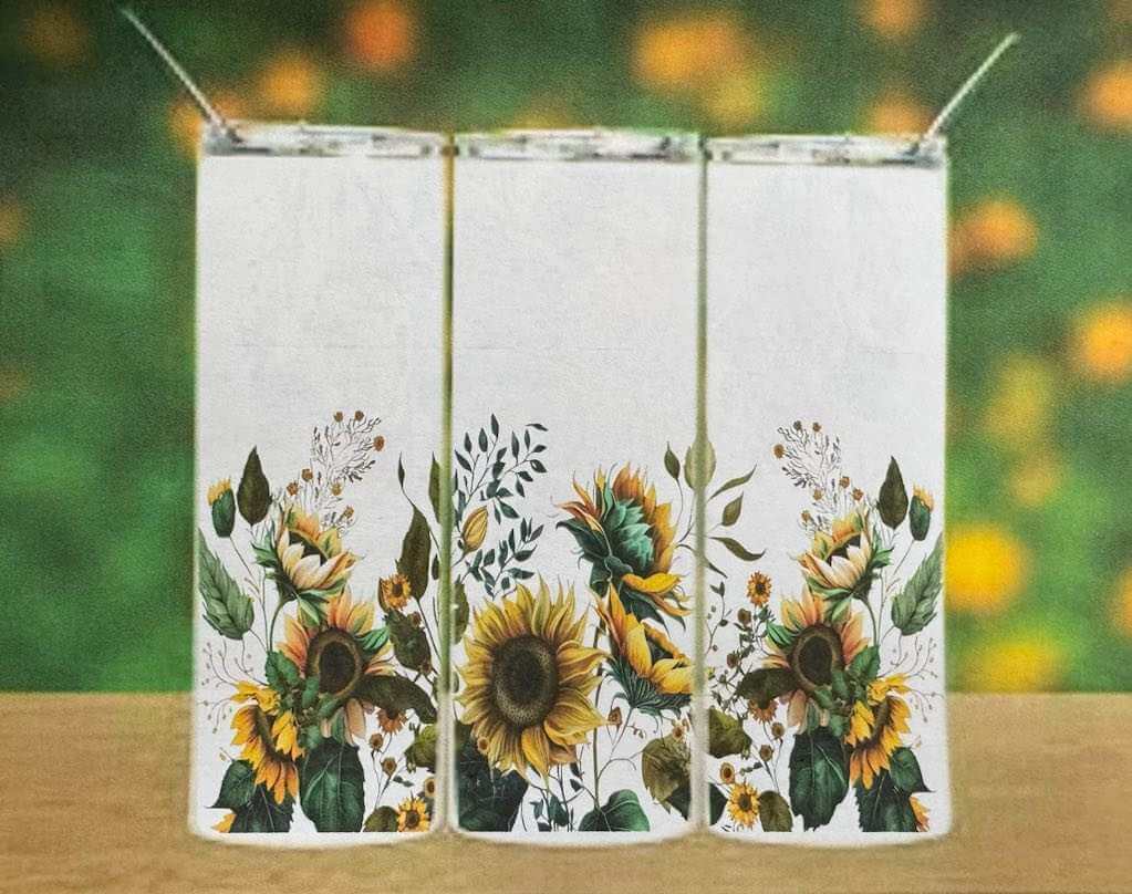 Set of double wall tumblers with sunflower designs, stainless steel, spill-resistant lids, and thermal insulation.