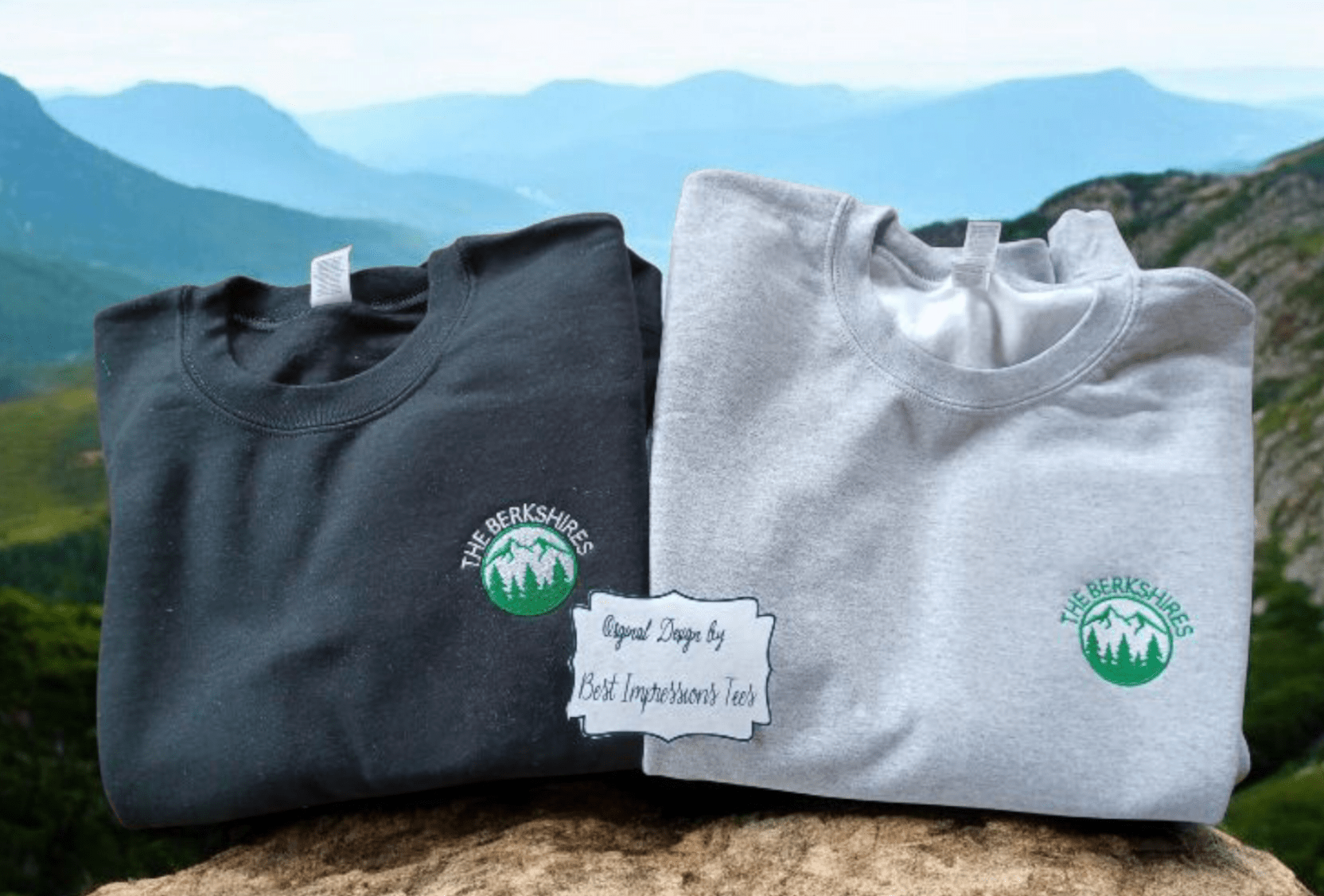 Embroidered The Berkshires grey and black crewneck sweatshirts with mountain logo design