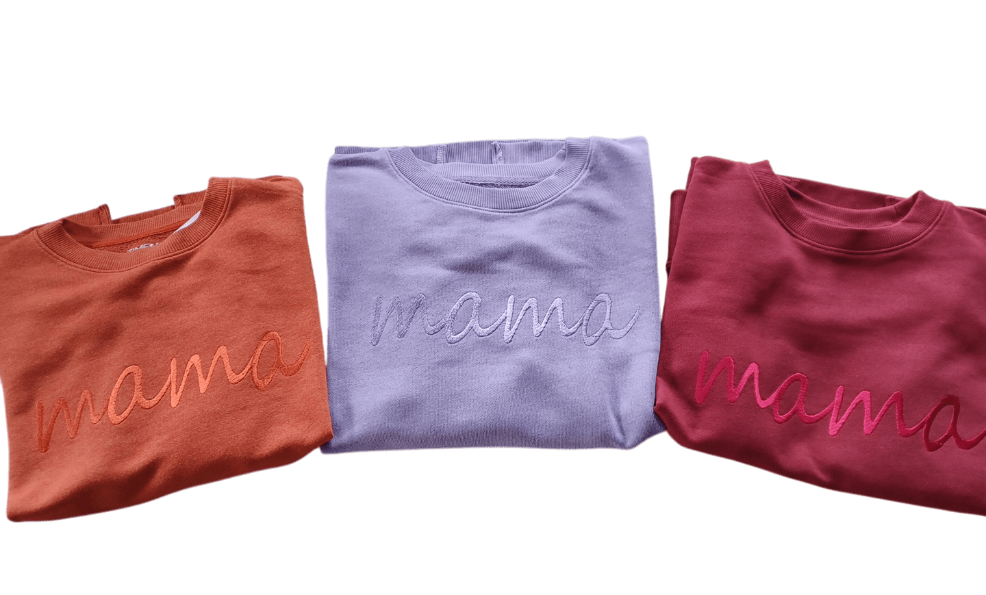 Mama embroidered relaxed fit cotton sweaters in rust orange, lavender, and deep red colors