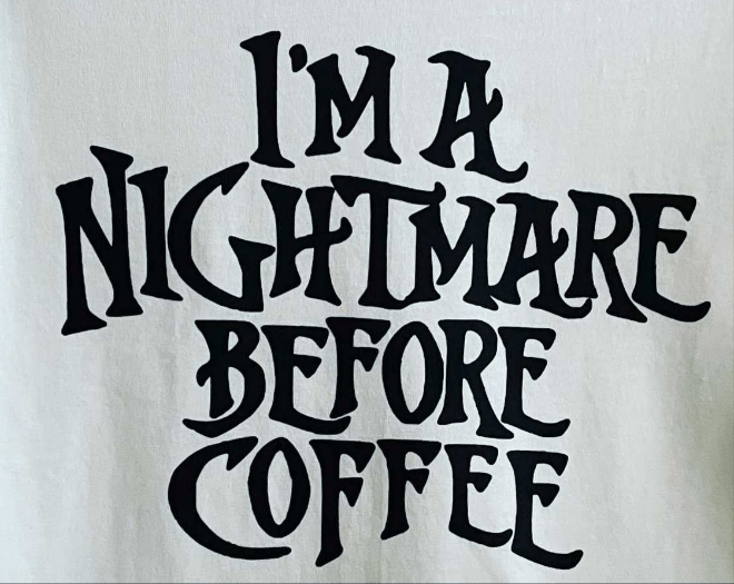 White Gildan cotton tee shirt with "I'm a nightmare before Coffee" black print text