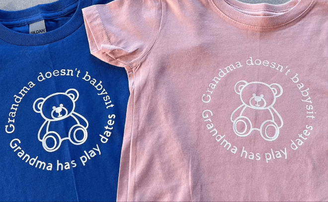 Toddler pink and blue tee shirts with teddy bear design and "Grandma doesn't babysit Grandma has play dates" text