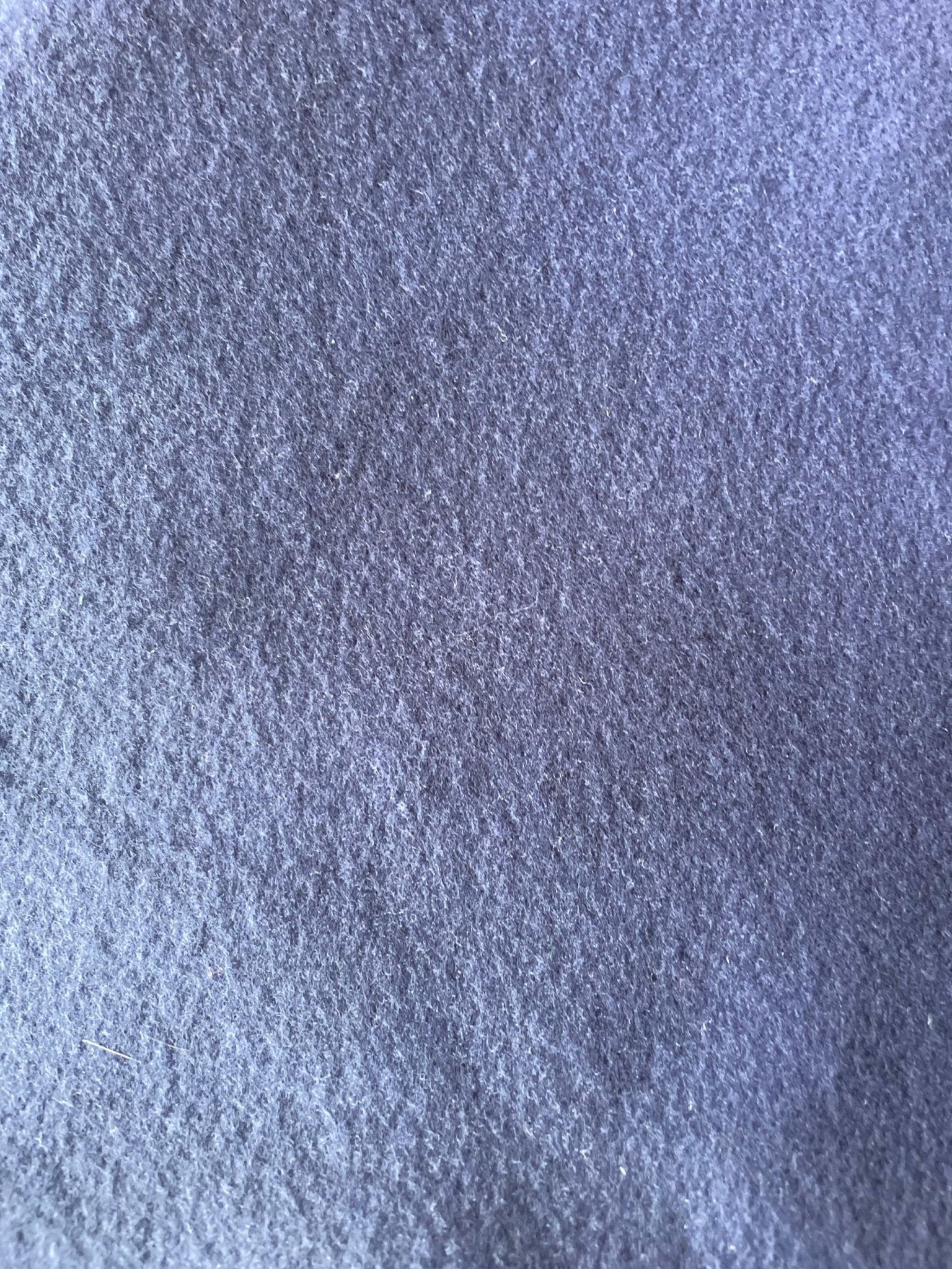 Close-up of soft royal blue Varsity Fleece Neck Warmer fabric texture